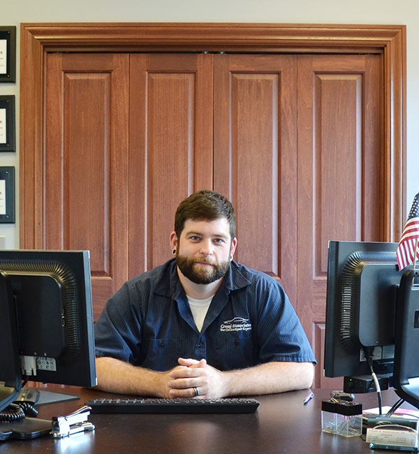 Anthony sitting in office
